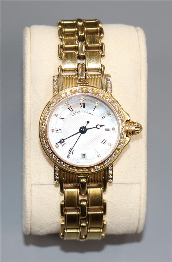 A ladys 18ct gold and diamond set Breguet wrist watch,